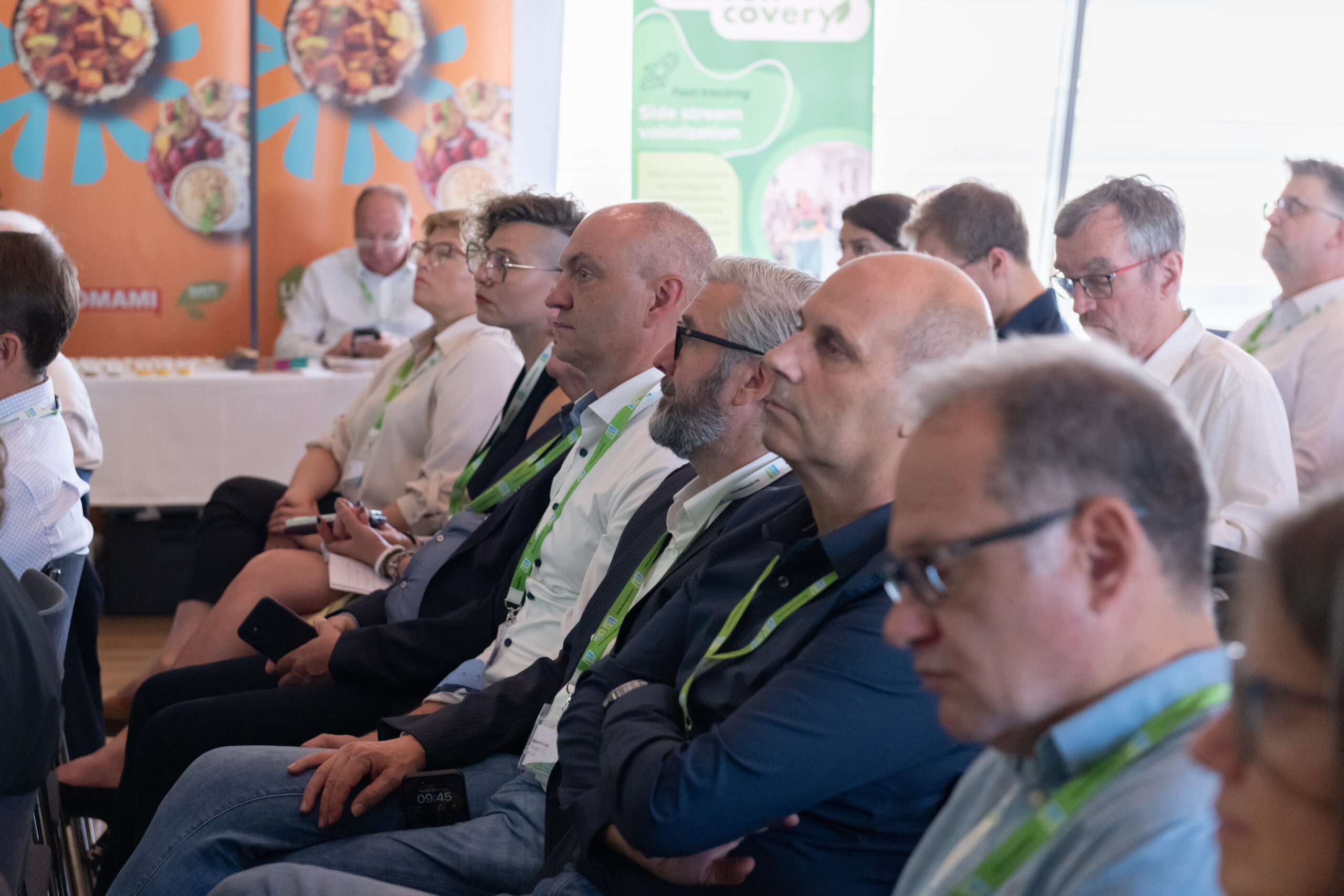 Spacious conference room at Urania Vienna with a stage, modern lighting, and seating for events.