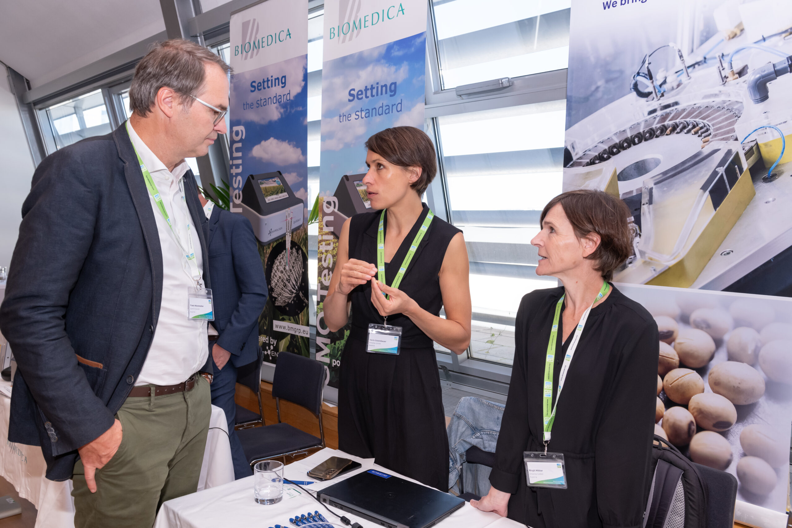 Spacious conference room at Urania Vienna with a stage, modern lighting, and seating for events.