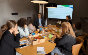 Business breakfast meeting with journalists discussing sustainable soya and agricultural topics